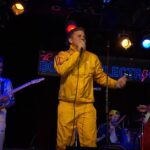 UNDER THE RUSH OF NEON LIGHTS